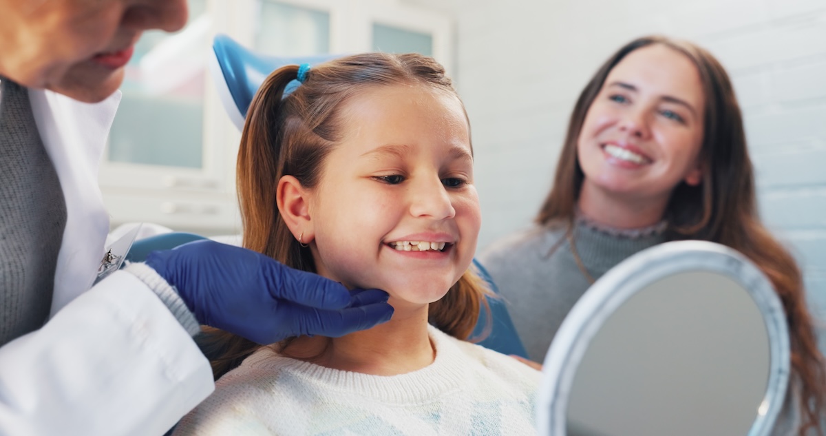 Happy child, dentist and mirror for oral hygiene or teeth health with advice from orthodontist. Girl, family or woman in clinic for dental care, wellness and results or education on cleaning of mouth. SSUCv3H4sIAAAAAAAAA21SXW/cIBD8Lzzfg+FsX3N/paqiNZAzCrAWrJNa0f33LstFbdO+zQz7MTv2h1qgBquuHyrEuFcqQAGzug4nVXx2vgh8K+d5EORdICwBorAFyK4ZkldXVVdEev42mXGc1ElB4Ir7SVUC2quvvIKZBfI37hf+ezfLPIG76r40wJXDf/V7sxU9yMDvykzDZTDDqGeYLvqsuZKl2UzaGA0zP05d+qyauWj8lDRLl9ZontSPk3p9J1/SwyjsLmCHWwk25FsnSGvLRG7huDA1m3XdiXuZ2tfGe0gZydOxcTaaD3ixbDrvaWntSp/naTSDkYtaYe13Os7ncbHktgYeWo6+UOYH93C4bxHBUTOpwOHiH+vbsr/8sOCKh1QppG4GIqRDkD+8T4ISVtpWJKxCDzhSsAWFbJjdJMhixL0s+LPrkFscie+FvsdvWMOfc5ZwExsi9RExbM5DbDnI3vbD8TdNPlPvsZC/9NR/JW3O5YXR/f4LBpqLFMQCAAA=